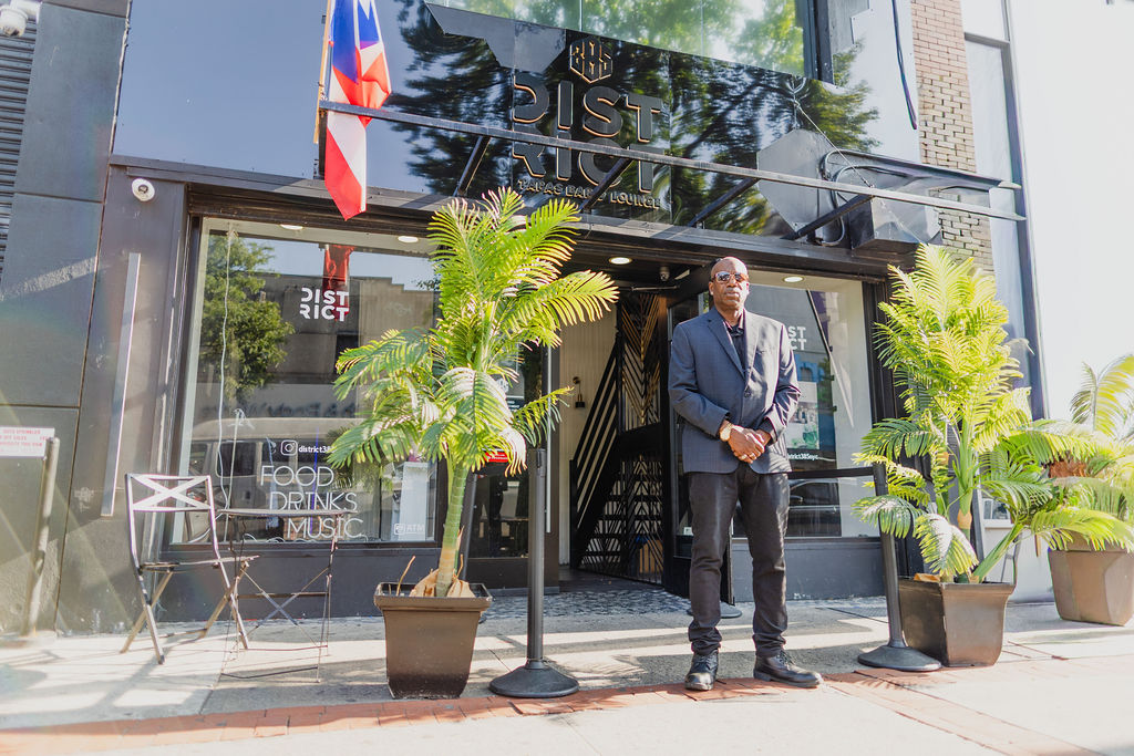 District385 doorman standing outside the Myrtle Avenue entrance