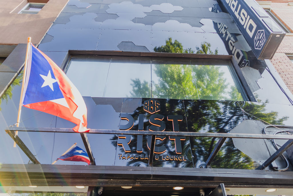 The District385 marquee and mirrored facade on Myrtle Avenue
