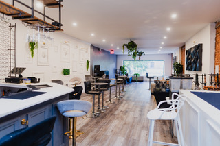 Daylight view down the District385 bar and lounge toward the back room
