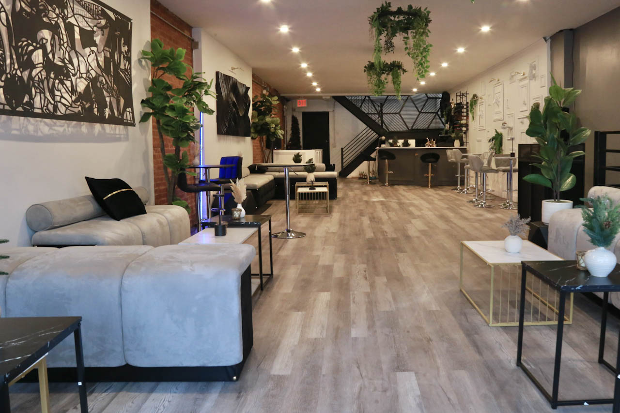 Daylight view of the District385 lounge seating and bar area